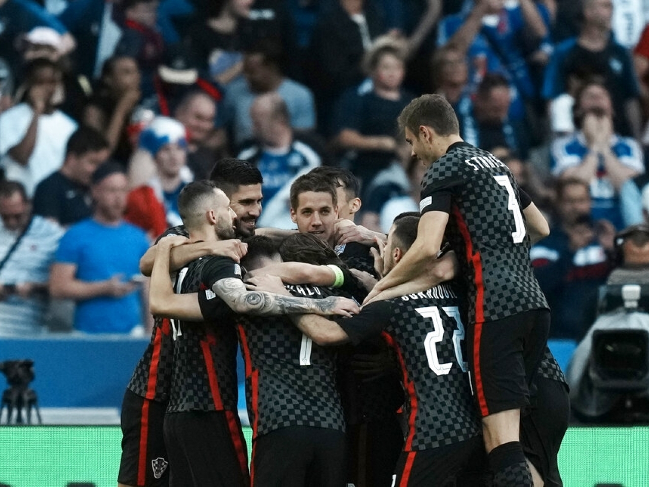 Luka Modric is surrounded by teammates after scoring for Croatia in a 1-0 Uefa Nations League win over France in Paris. Photo: AP