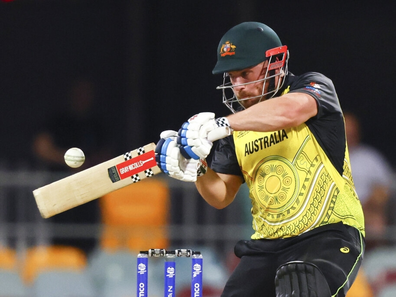 Australia's Aaron Finch plays a shot during his team's T20 World Cup match against Ireland in Brisbane. Australia won by 42 runs. Photo: AP