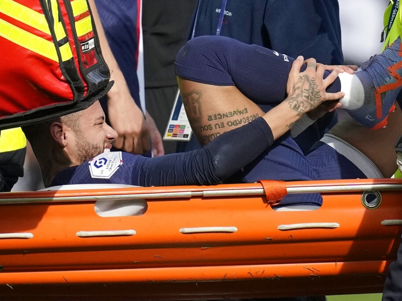 PSG's Neymar is carried off the field on a stretcher during a league match against Lille at the Parc des Princes in Paris. Photo: AP