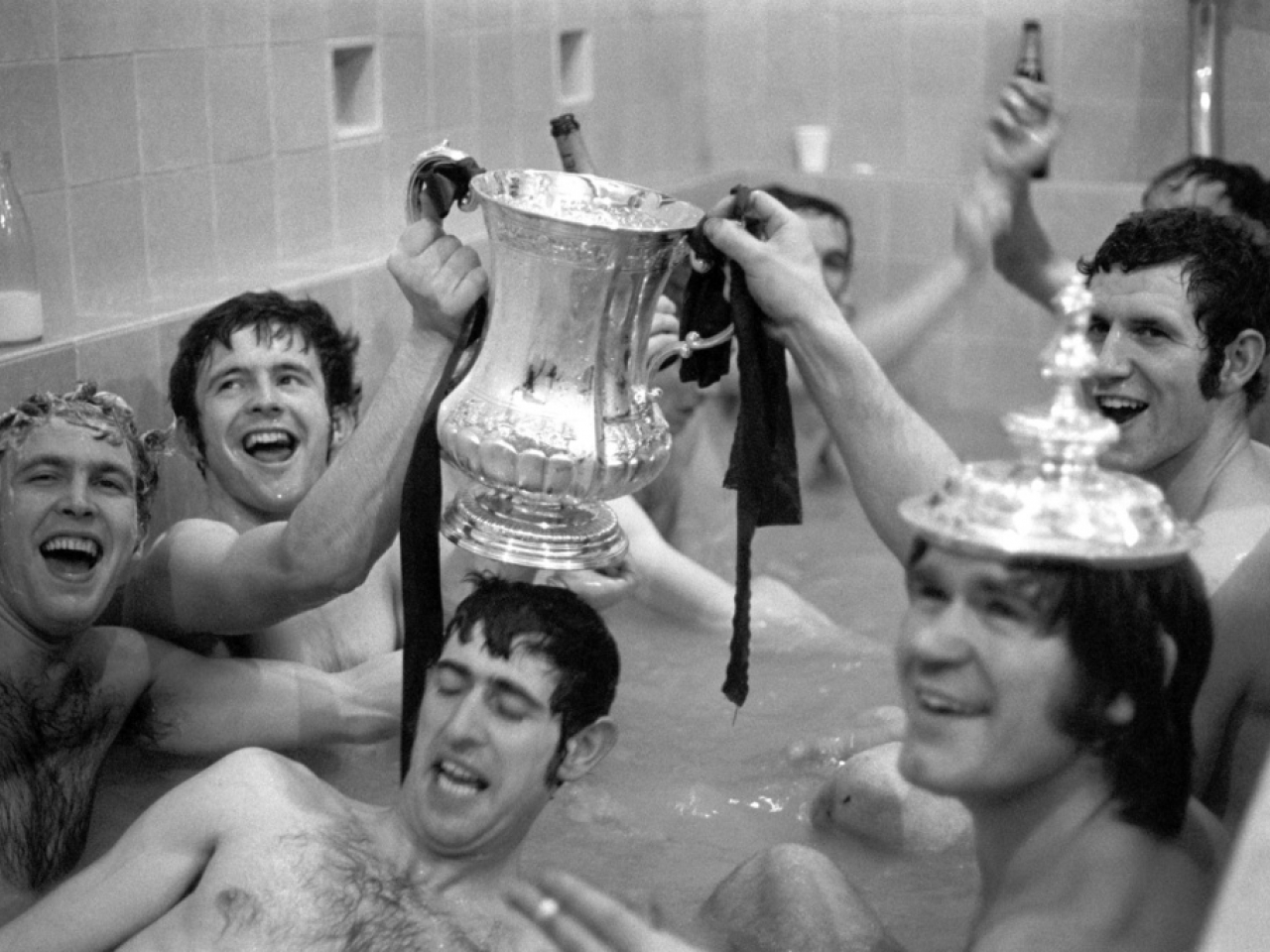 John Hollins, (second left), and team-mates celebrating with the FA Cup on April 29, 1970. Photo: AP
