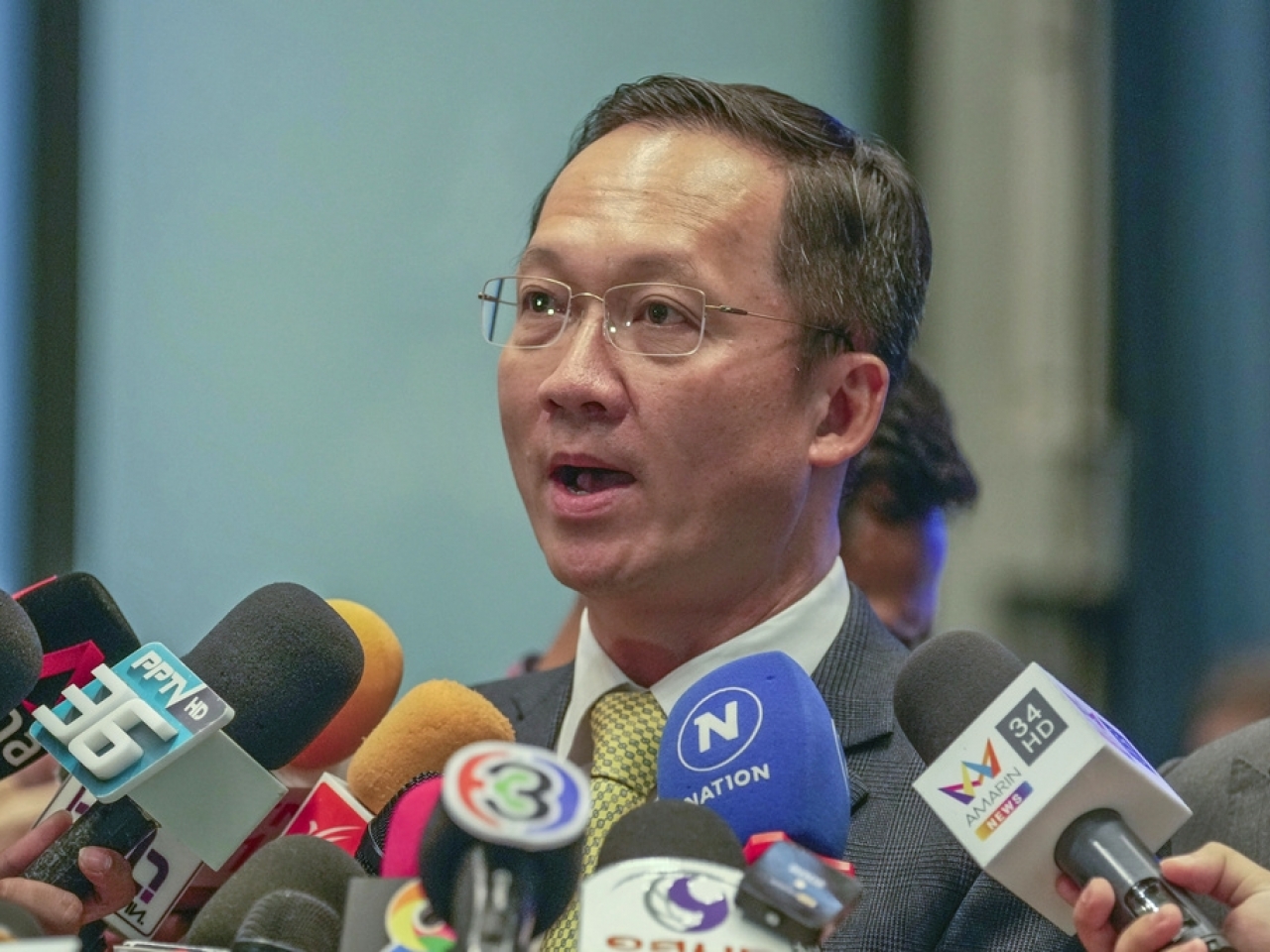 United Thai Nation Party spokesperson Akaradej Wongpitakroj explains the plan to reporters. Photo: AP