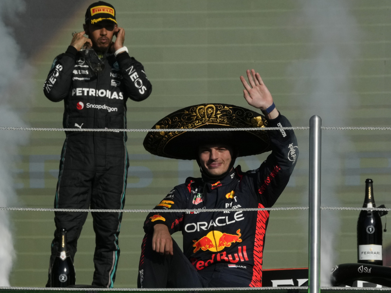 Verstappen waves to fans as he celebrates win number 16 out of the 19 GPs this season. He's finished on the podium in all but one. Photo: AP