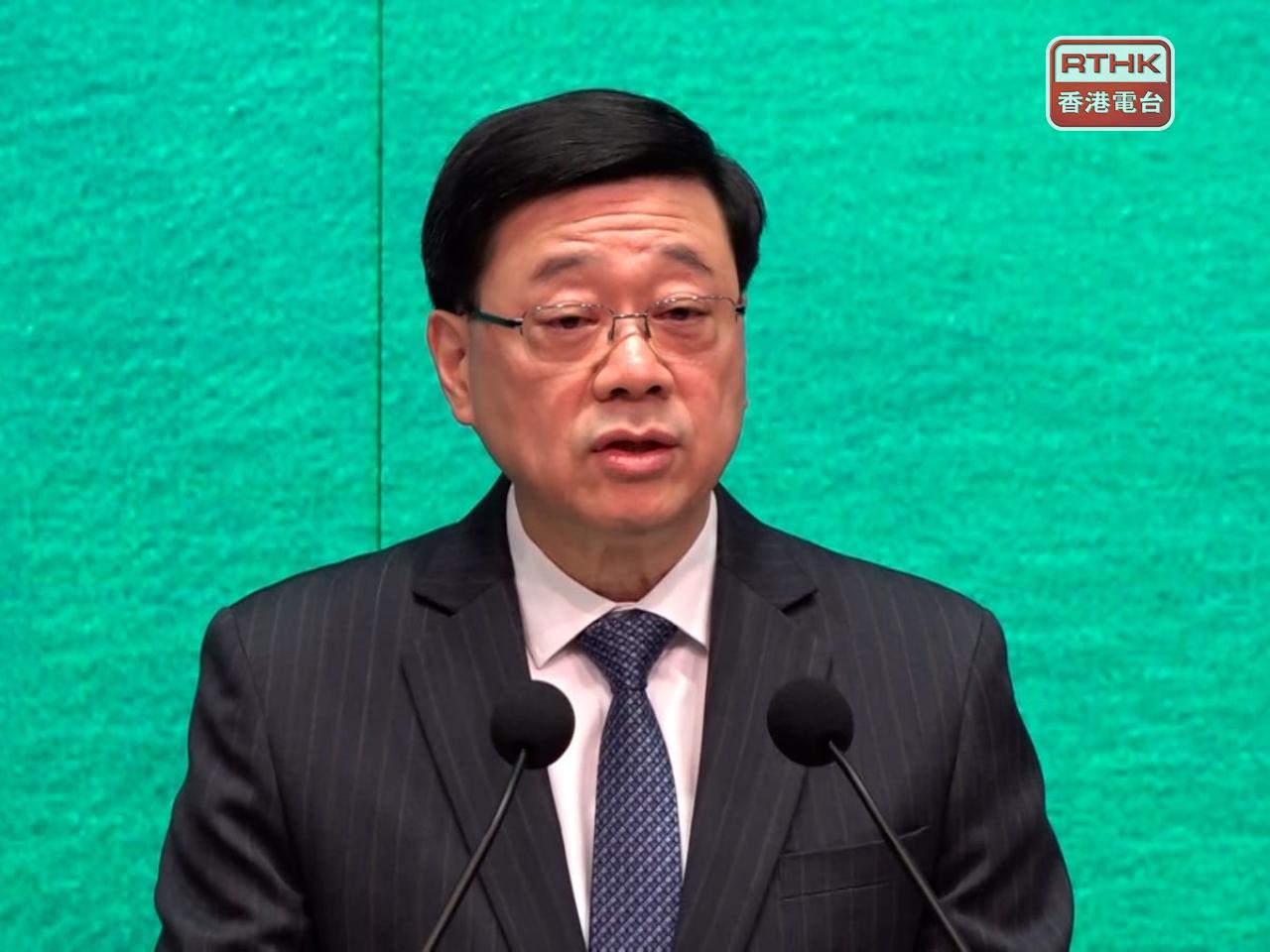 李家超說，現時仍有10名港人被扣押。（郭志強攝）