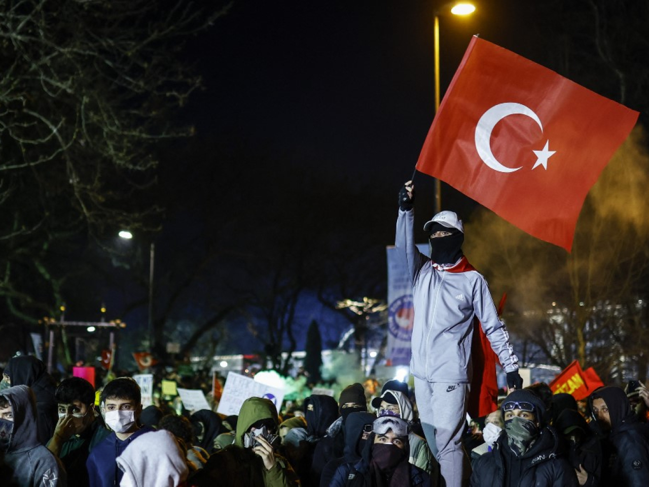 A protester in Istanbul waves Turkey's national flag. Photo: AFP