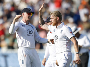 England skipper Ben Stokes (right) was named player of the match after taking five wickets across 44 overs. Photo: Reuters