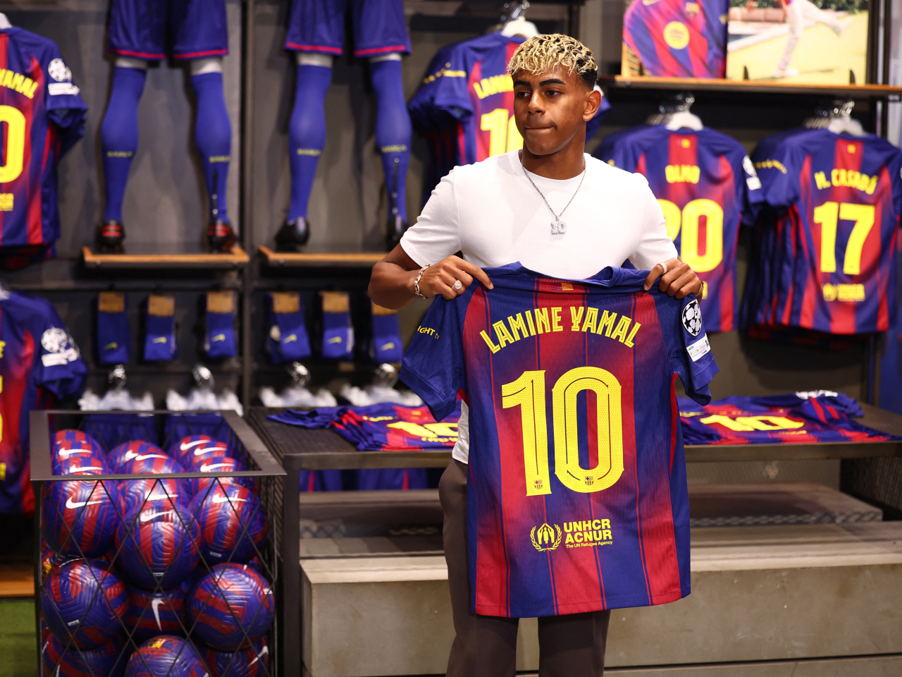 Yamal signed a new deal that will keep him at the La Liga champions for the next six years. Photo: Reuters