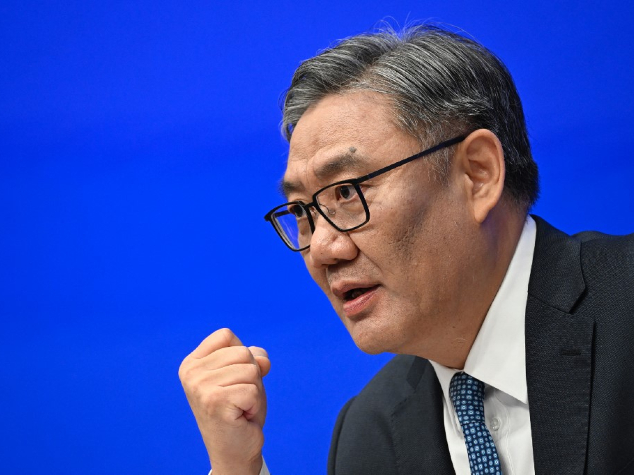 Commerce Minister Wang Wentao says retail sales of consumer goods grew 5.5 percent on average annually over the past four years  and are expected to top 50 trillion yuan in 2025. Photo: AFP
