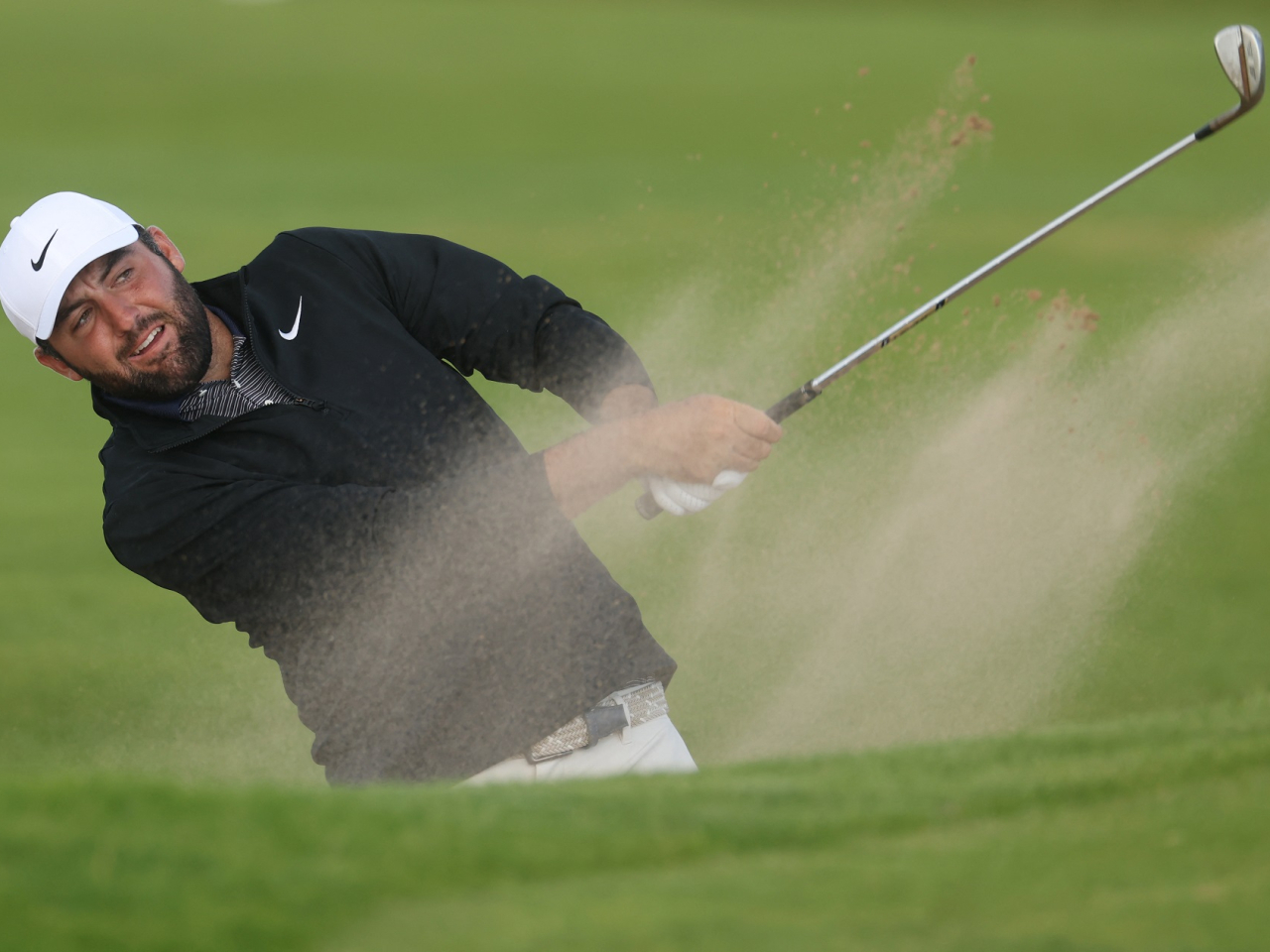 Scheffler is 18 holes away from clinching his maiden victory at the Open Championship. Photo: Reuters