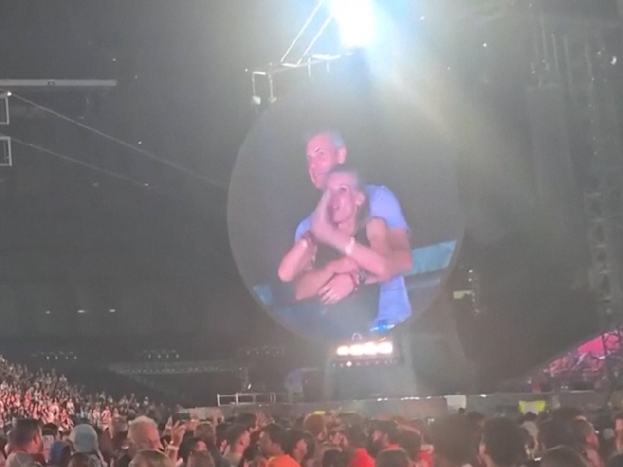 During a Coldplay concert in Massachusetts, the jumbotron zoomed in on a man and a woman embracing in the stands. File photo: @calebu2/TMX