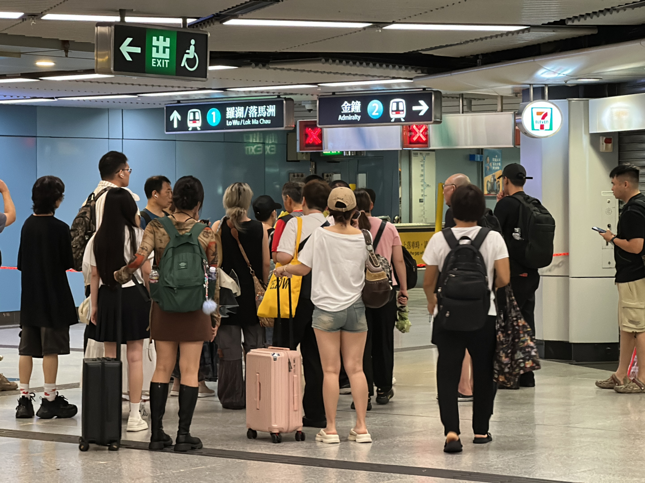 Train services on exposed, open-air sections were halted, while underground lines maintained limited operations. Photo: RTHK