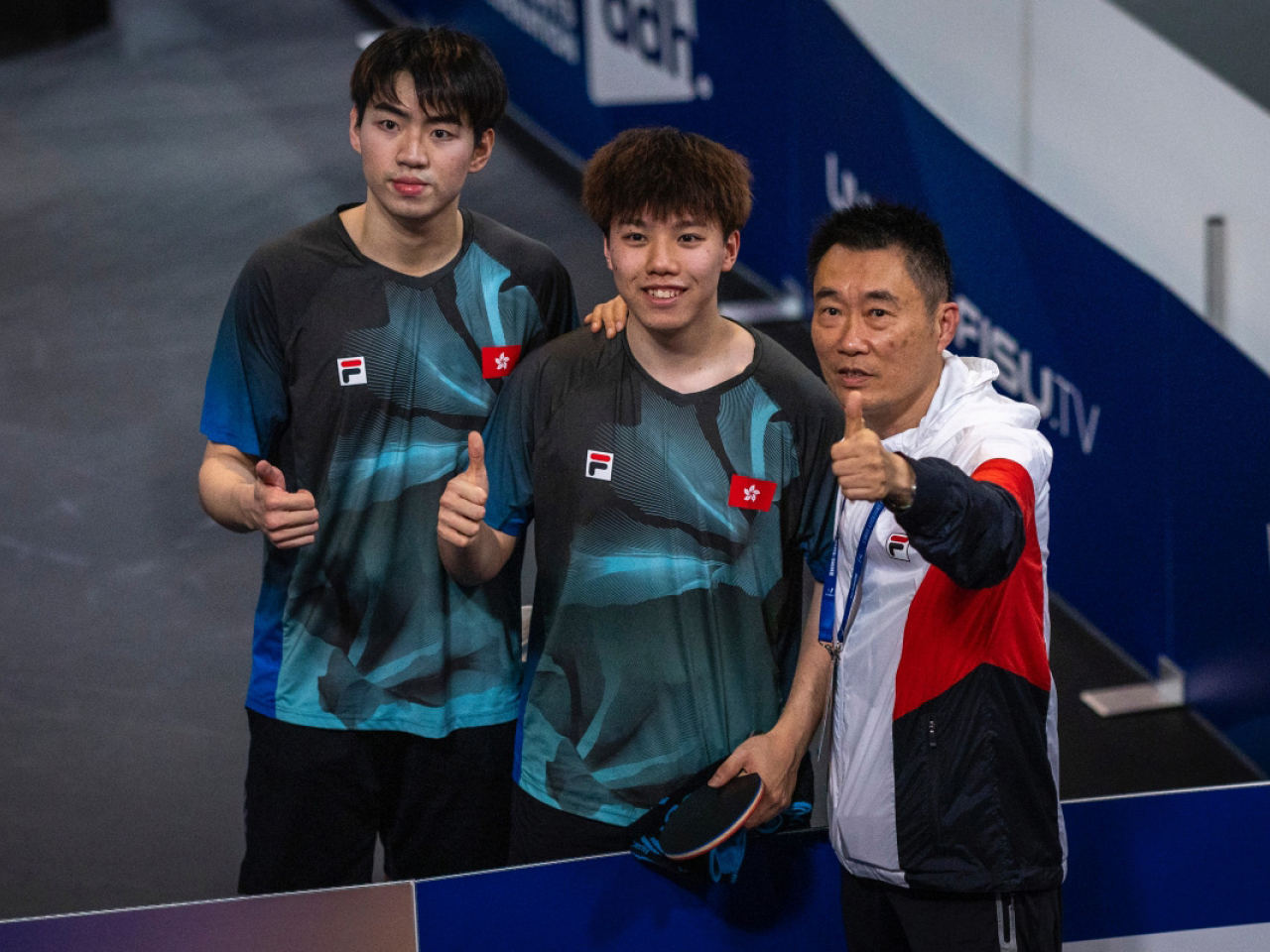 港隊的陳顥樺、姚鈞濤組合，在乒乓球男雙決賽擊敗日本，為港隊奪得今屆第二金。（世界大學生運動會）