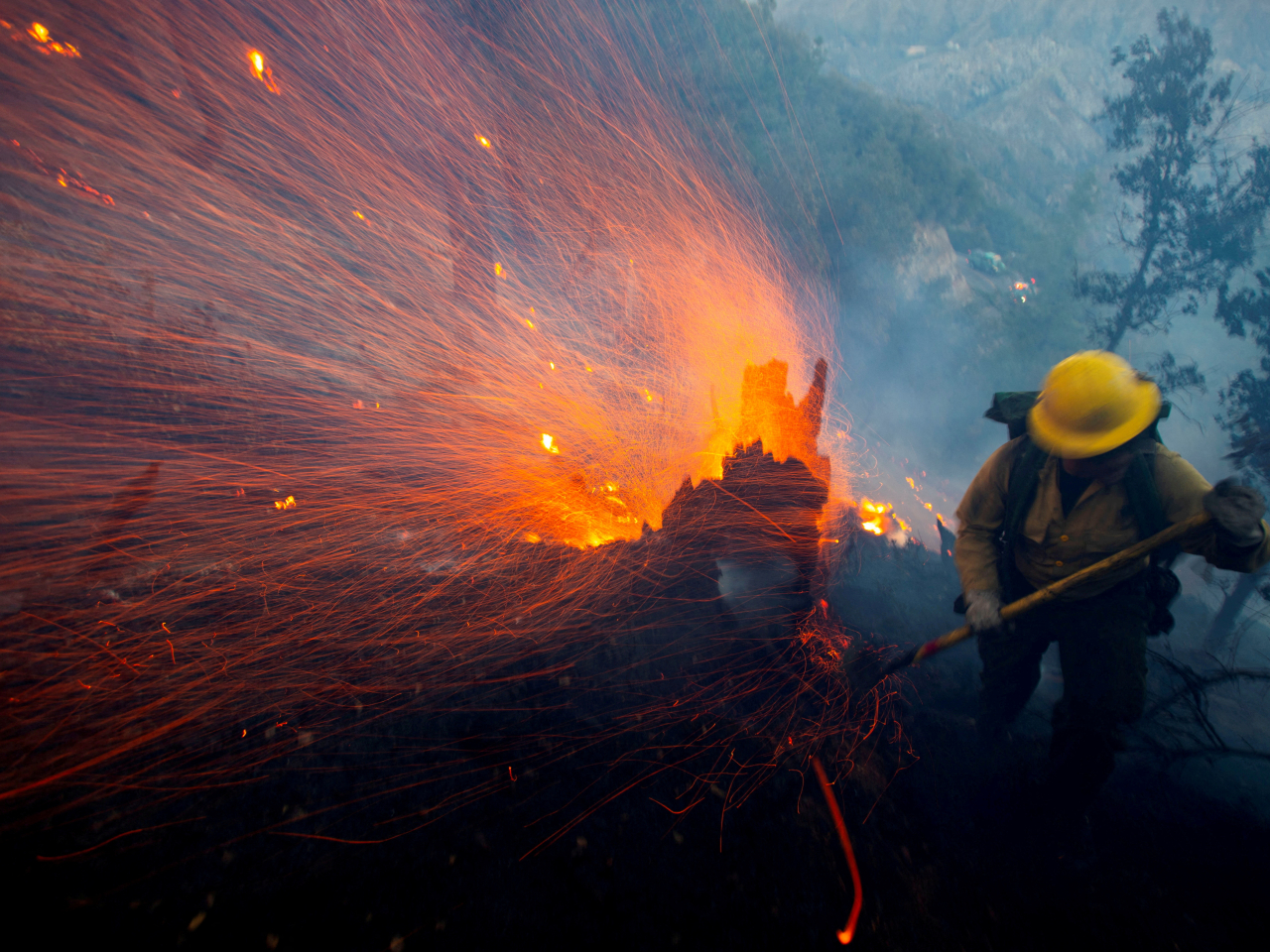 A firefighter battles a blaze in the Angeles National Forest near Mount Wilson during the Eaton Fire, which is suspected to be caused by Southern California Edison equipment. File photo: Reuters