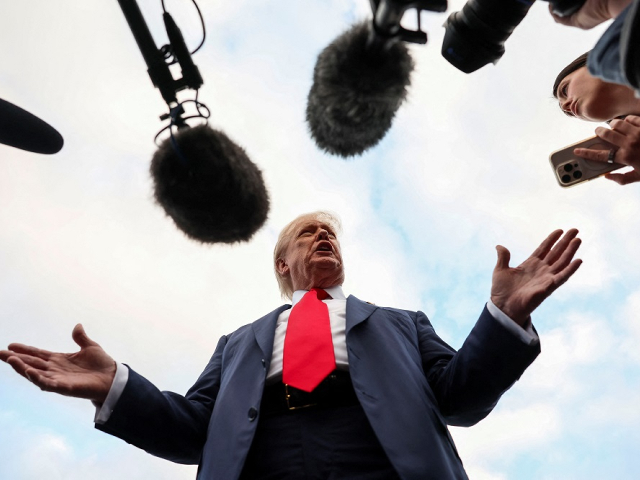 Donald Trump takes questions after landing in Scotland. Photo: Reuters