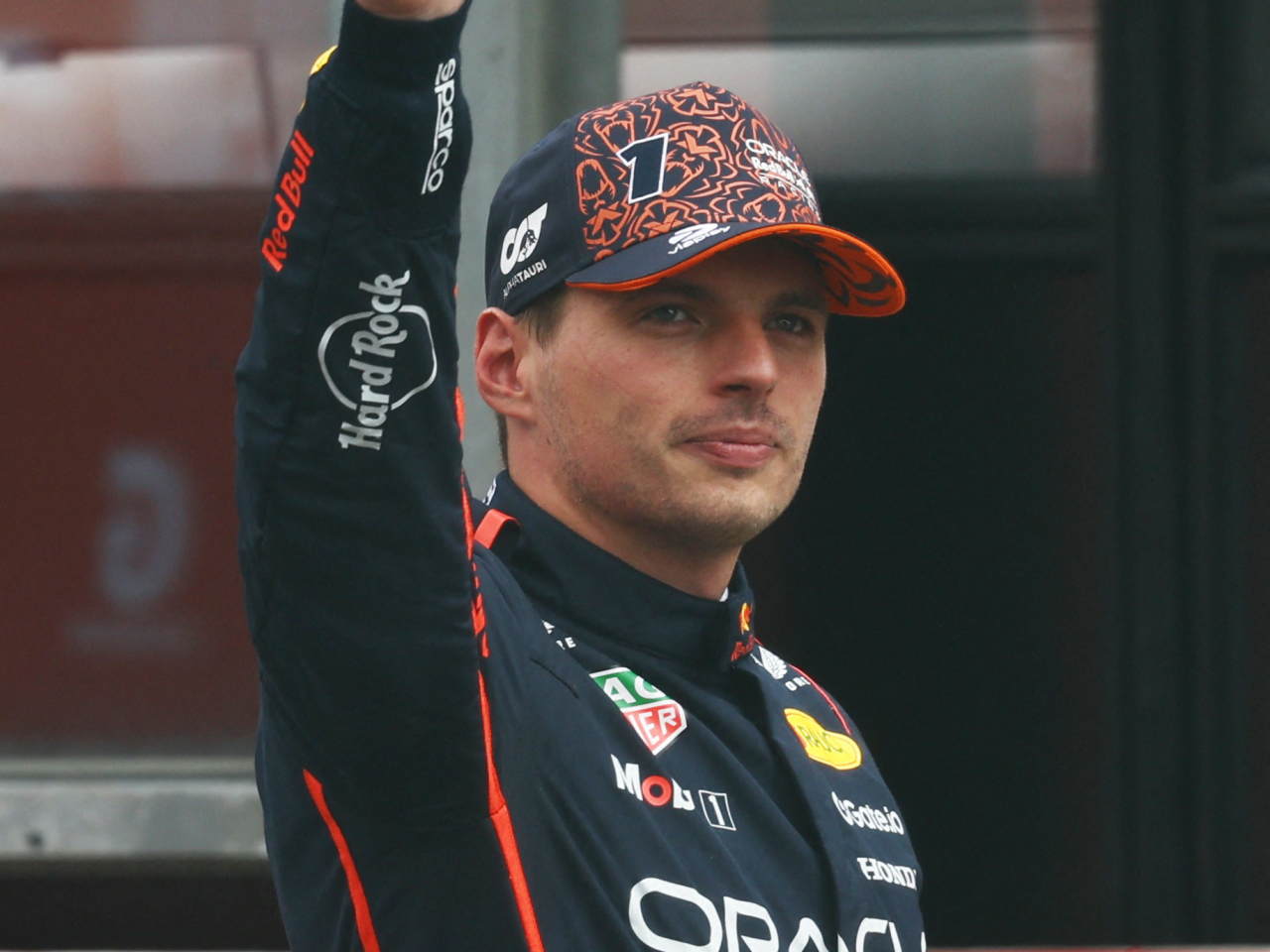 Red Bull's Verstappen waves to the crowd after winning the sprint race at Circuit de Spa-Francorchamps. Photo: Reuters