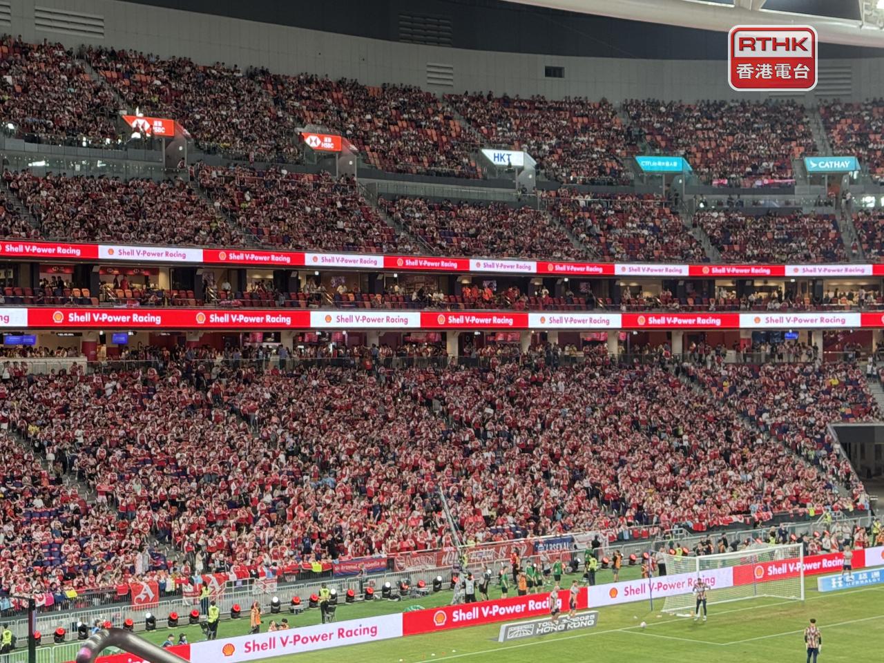 The stadium quickly transformed into a sea of red and white, with a crowd of over 49,900 spectators supporting their teams. Photo: RTHK