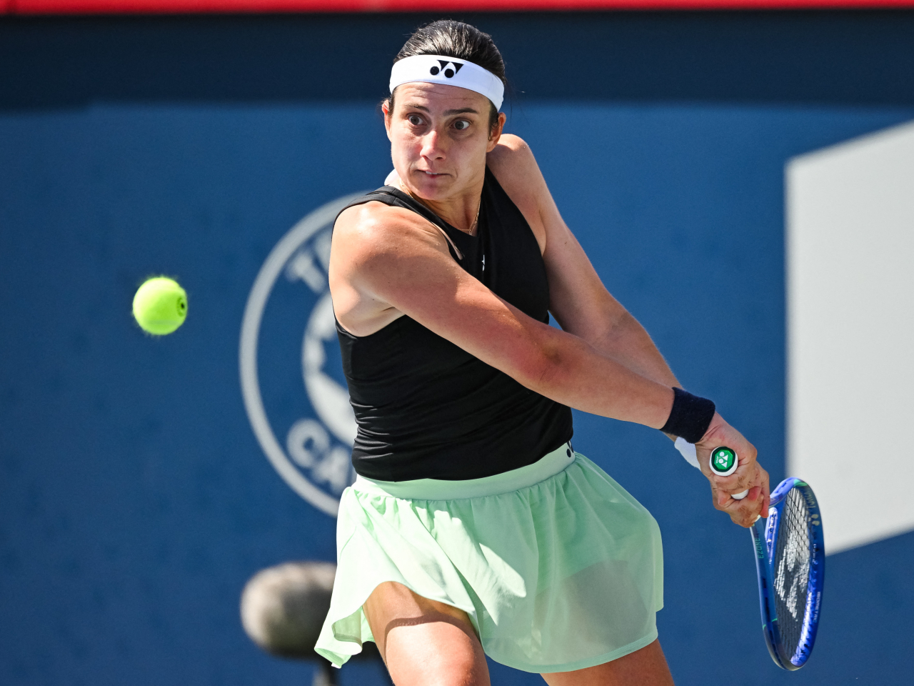 Anastasija Sevastova looks to return a shot from Jessica Pegula at the IGA Stadium in Montreal. Photo: Reuters