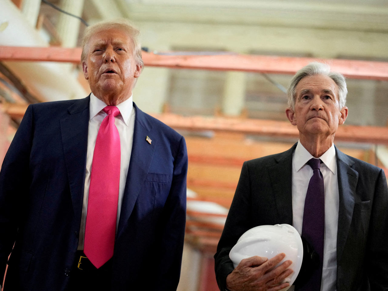 Donald Trump inspects renovations at the Federal Reserve with with Jerome Powell, right, amid suggestions he was looking to fire the chairman over cost overruns. File photo: Reuters
