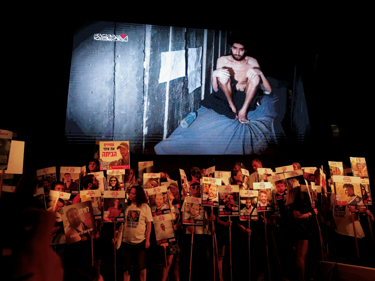 Demonstrators demand the immediate release of hostages as a video released by Hamas of hostage Evyatar David is displayed in Tel Aviv. Photo: Reuters