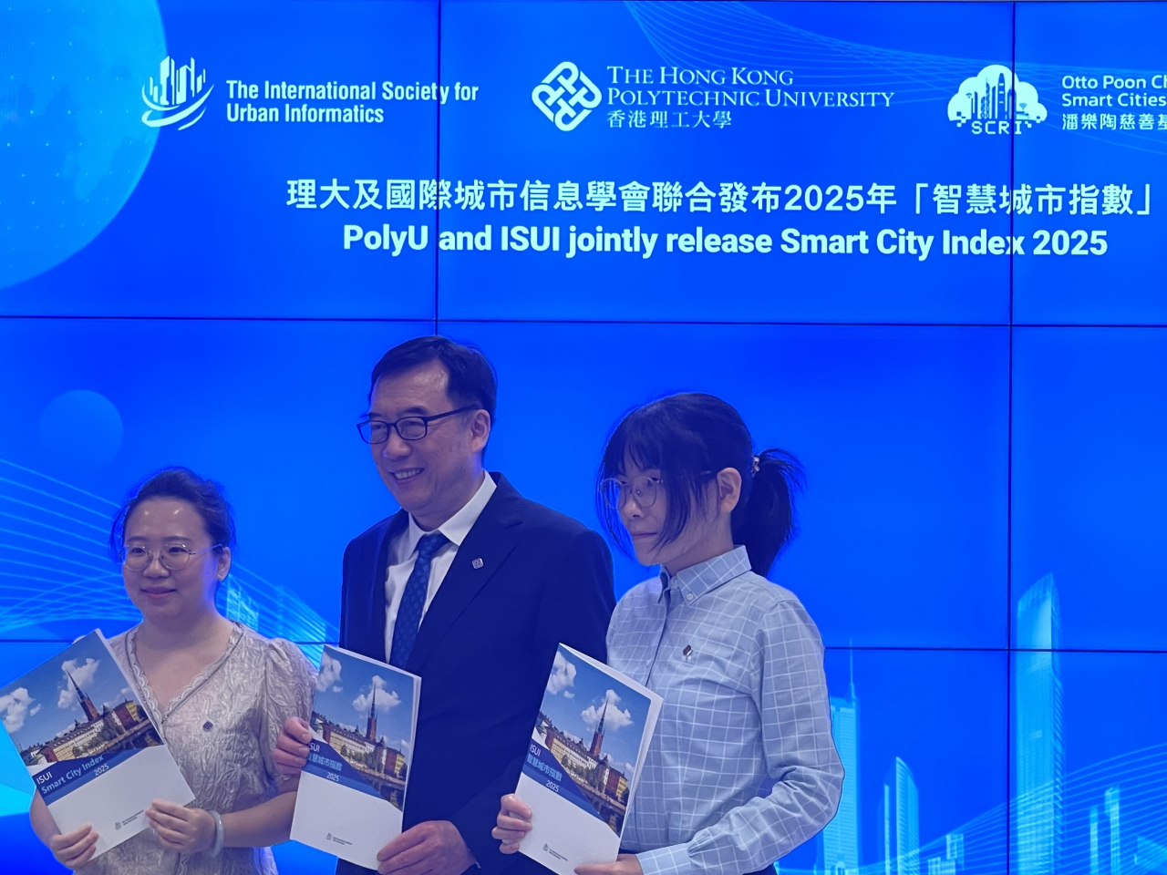 Professor John Shi, middle, says Hong Kong excelled in categories such as the economy and governance. Photo: RTHK