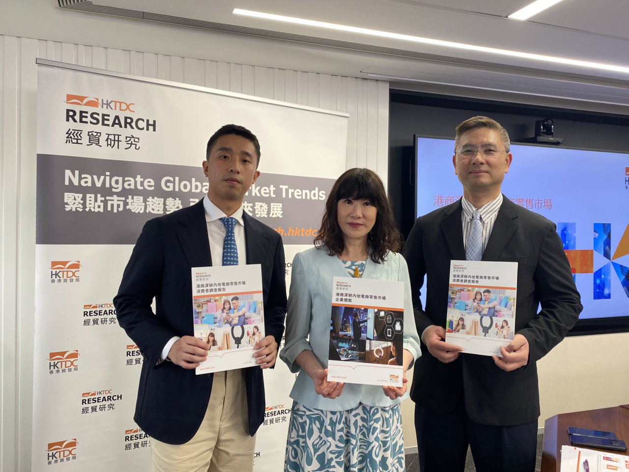 Trade Development Council principal economist Wing Chu, right, says Hong Kong companies have the upper hand when tapping into the mainland market. Photo: RTHK