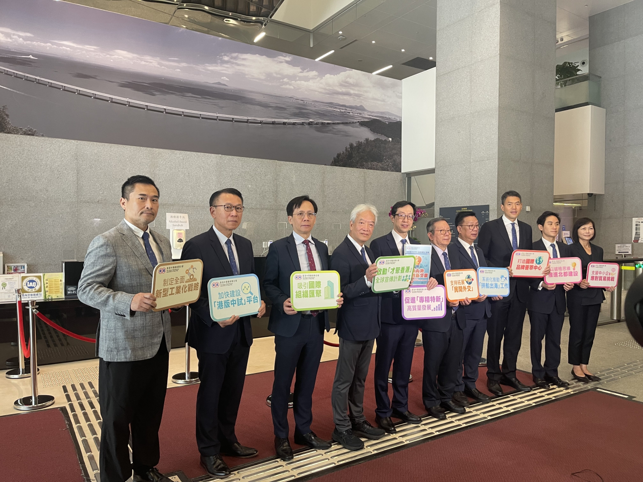 Members of the Chinese Manufacturers' Association of Hong Kong met with Chief Executive John Lee on Friday. Photo: RTHK