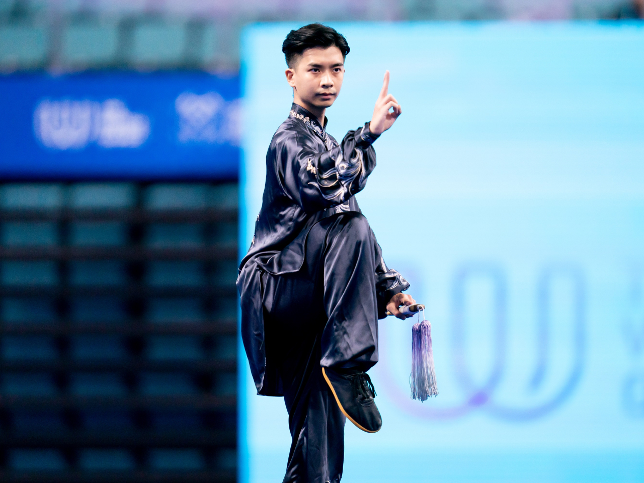 Hong Kong, China, wushu athlete Anthony Yeung won the Taijiquan-Taijijian combined event. Photo courtesy of the Sports Federation & Olympic Committee of Hong Kong, China