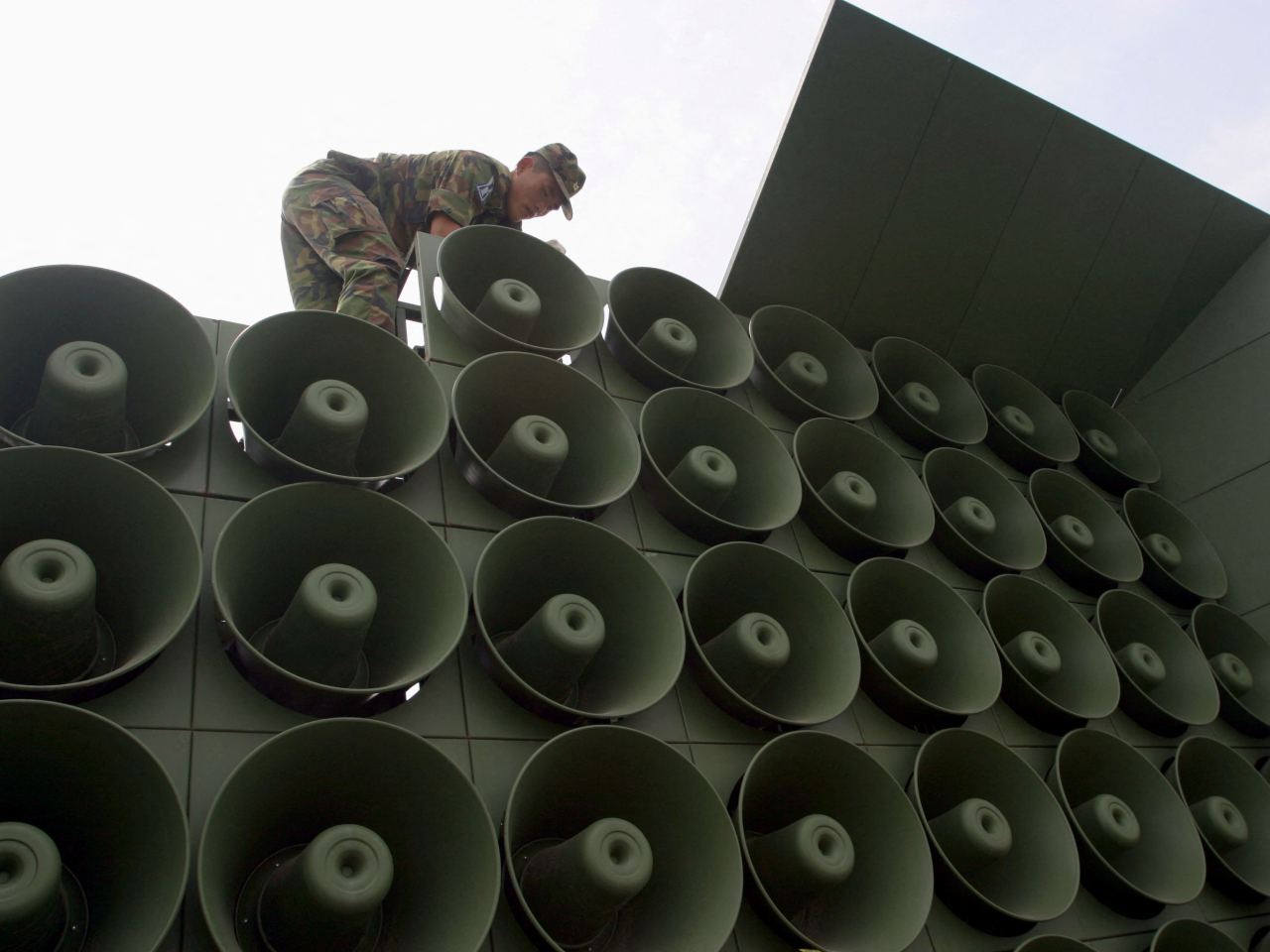 A South Korean soldier dismantles a loudspeaker system near the demiltarized zone in Paju in June. File photo: Reuters