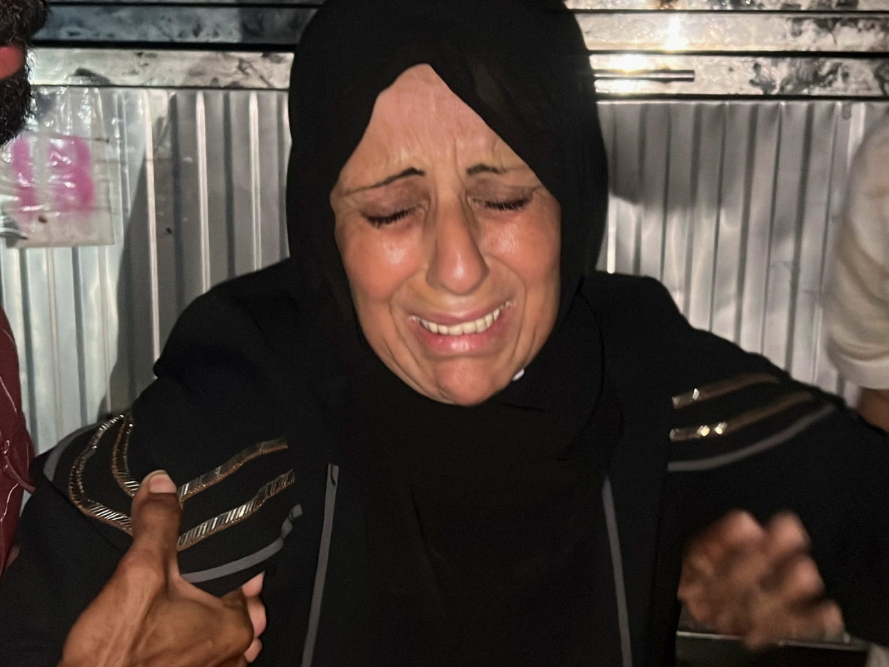 A relative of Al Jazeera journalist Mohammed Qreiqeh, who Al Jazeera says was killed by an Israeli strike, mourns in Gaza City. Photo: Reuters