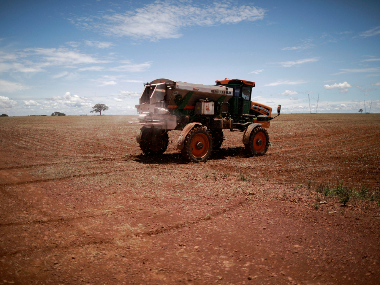 A tractor spreads fertiliser in a soybean field in Brazil, one of the biggest exporters of the bean to China. File photo: Reuters