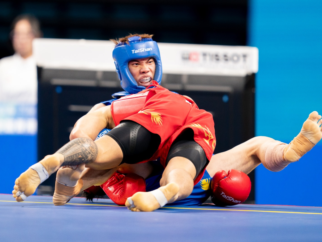 Wushu athlete Cheung Yat-lam competes in the men's wushu 70kg final. Photo courtesy of the Sports Federation & Olympic Committee of Hong Kong, China