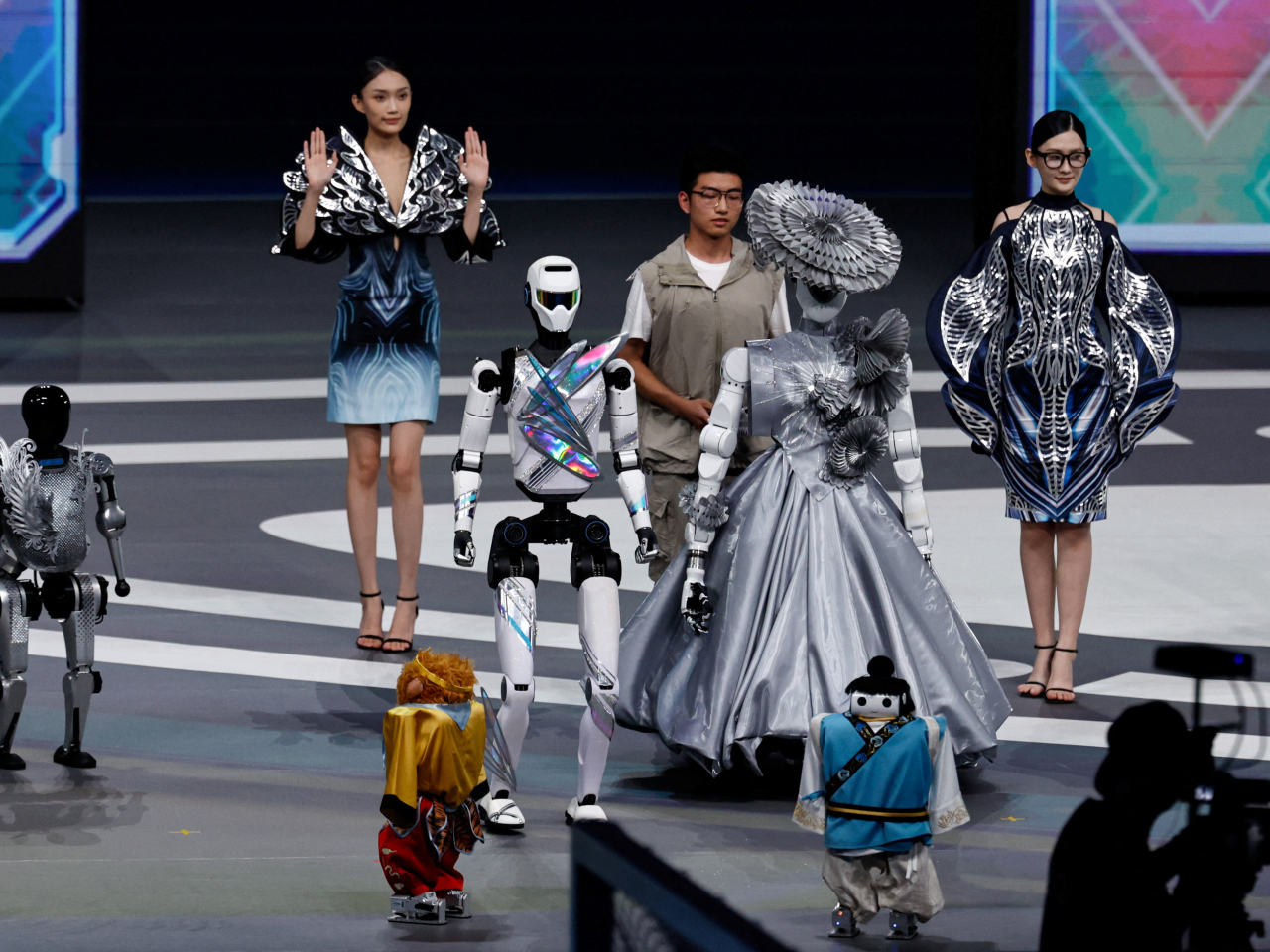 Models and humanoid robots give a glimpse of the future in the opening ceremony of the Games at the National Speed Skating Oval in Beijing. Photo: Reuters