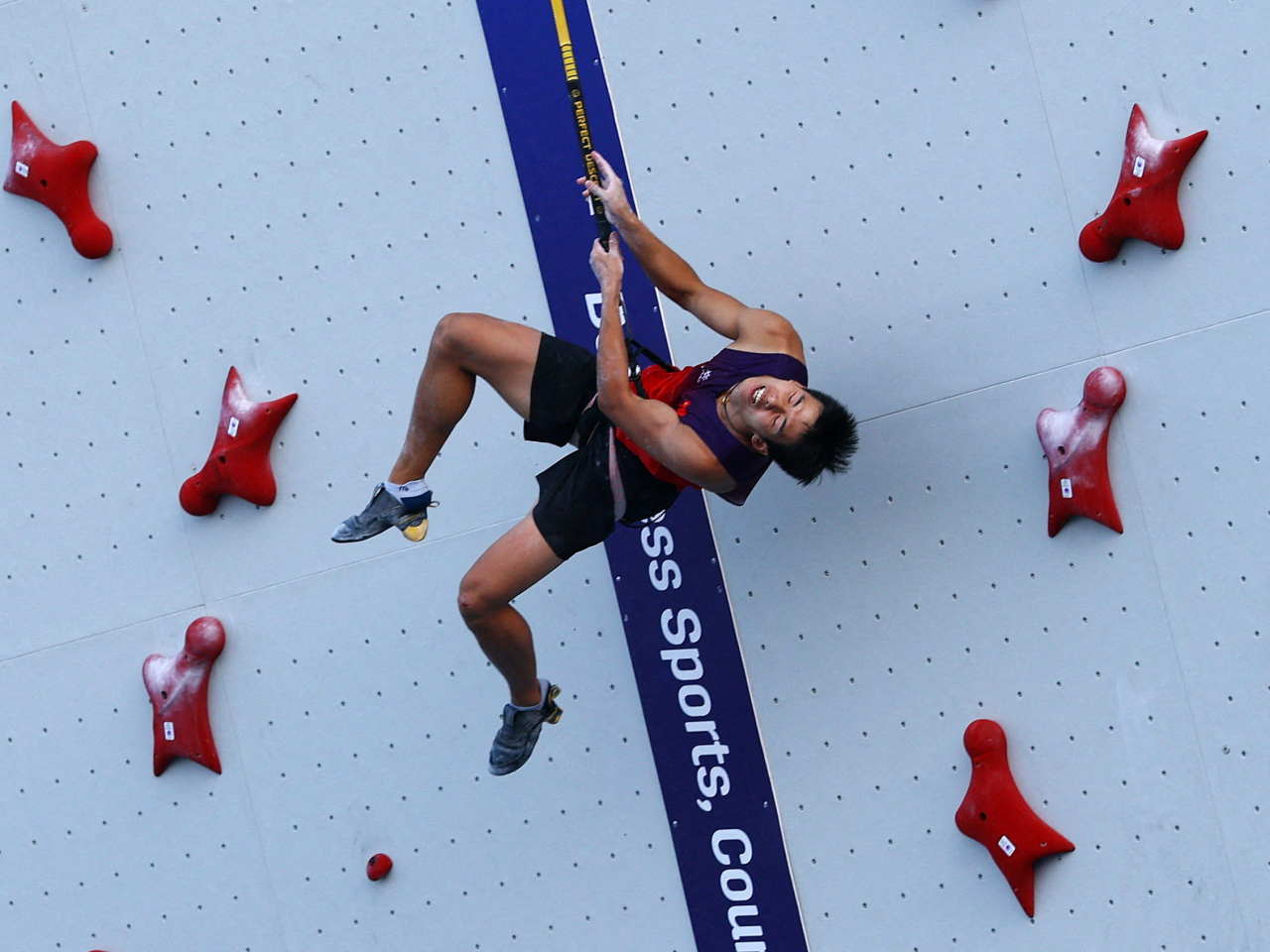 Long Jianguo of China claims his second gold medal in climbing at the World Games in Chengdu. File photo: Reuters
