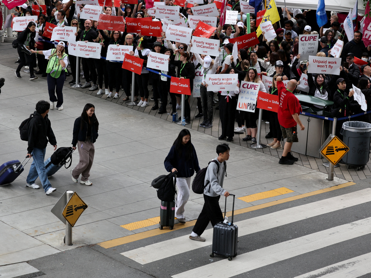 Air Canada flight attendants said they will remain on strike and challenge a return-to-work order they called unconstitutional. File photo: Reuters