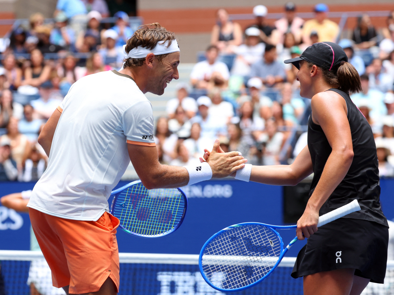 Swiatek was paired with Norway's Casper Ruud in the revamped US Open mixed doubles event. Photo: Reuters