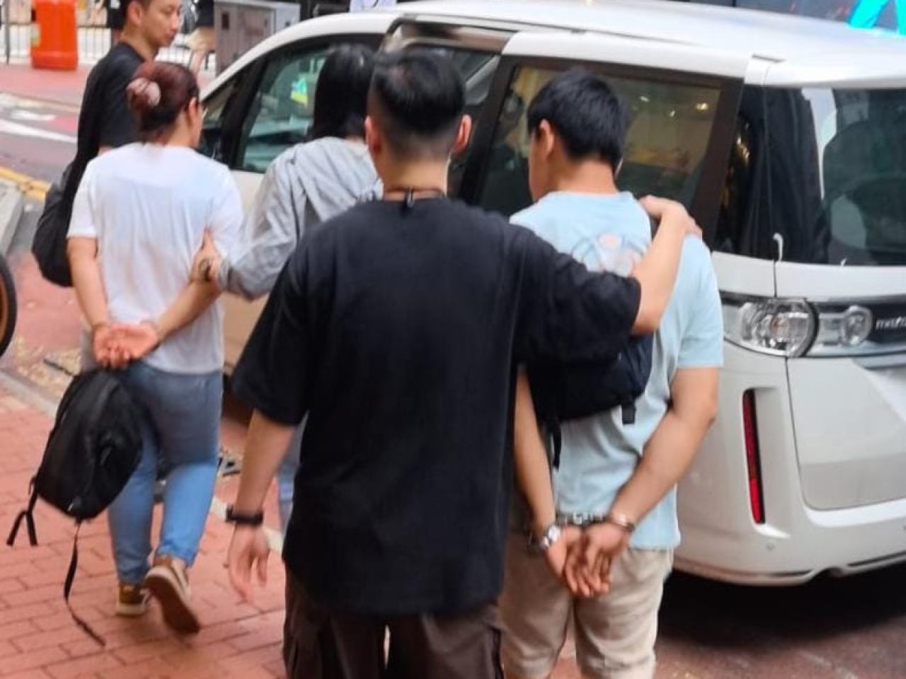 The pair were arrested at a building on Lee Garden Road. Photo: Courtesy of Hong Kong Police