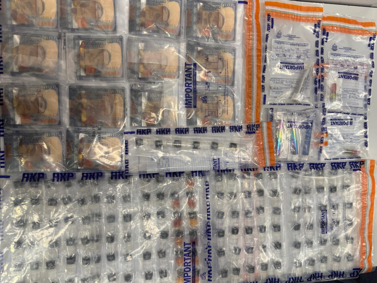Officers seized over 130 e-cigarette cartridges containing suspected etomidate as part of the haul. Photo: Courtesy of Hong Kong Police