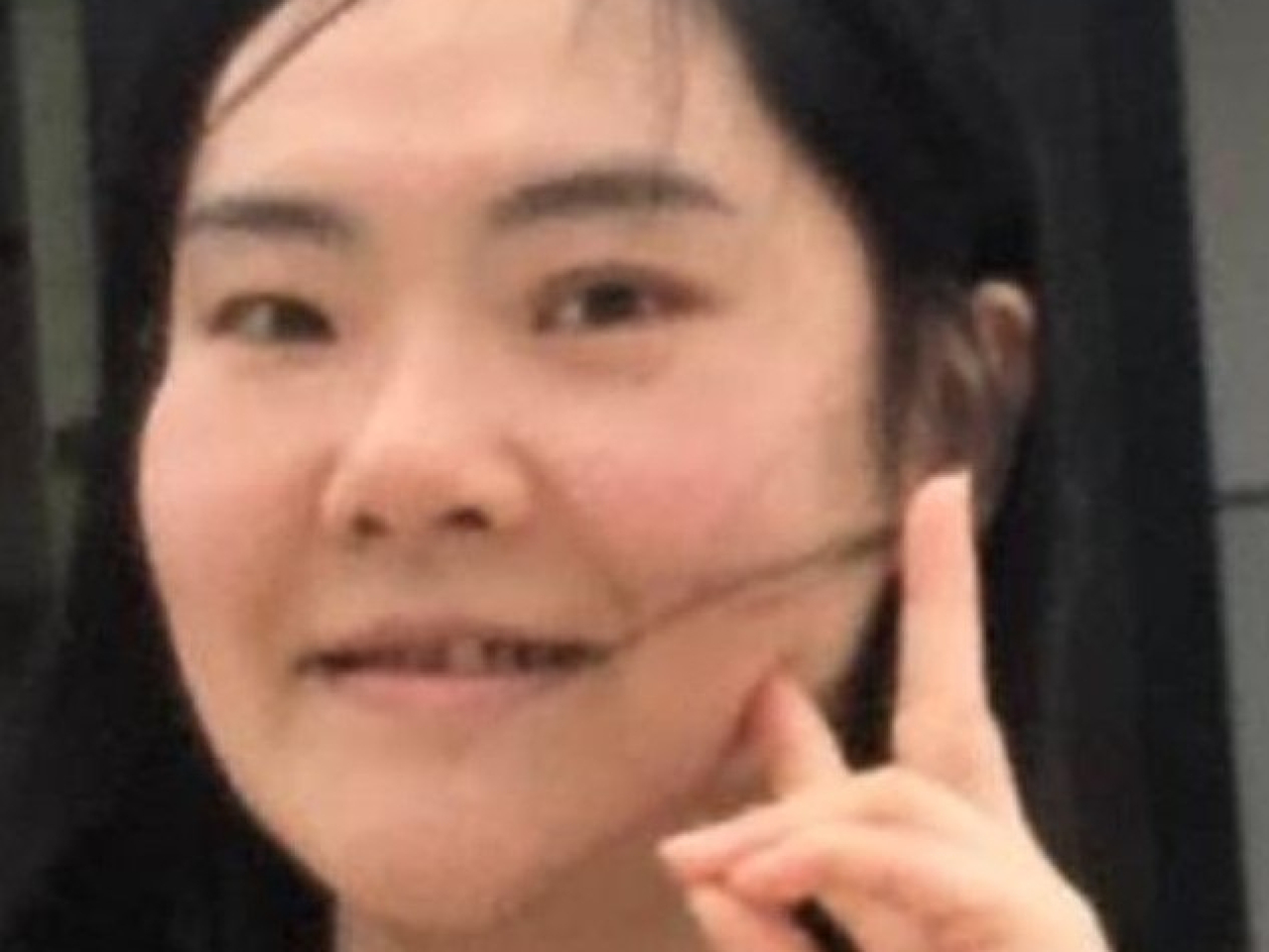 失蹤女子身高約1.52米，體重約55公斤，肥身材，圓面型。（政府新聞處)