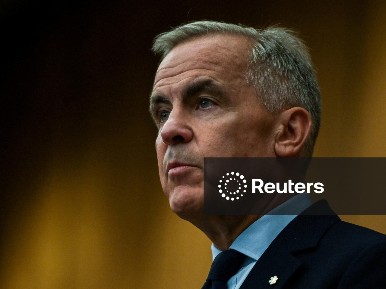 Canada's Prime Minister Mark Carney said Canadian tariffs on US autos, steel and aluminium would remain for now. Photo: Reuters