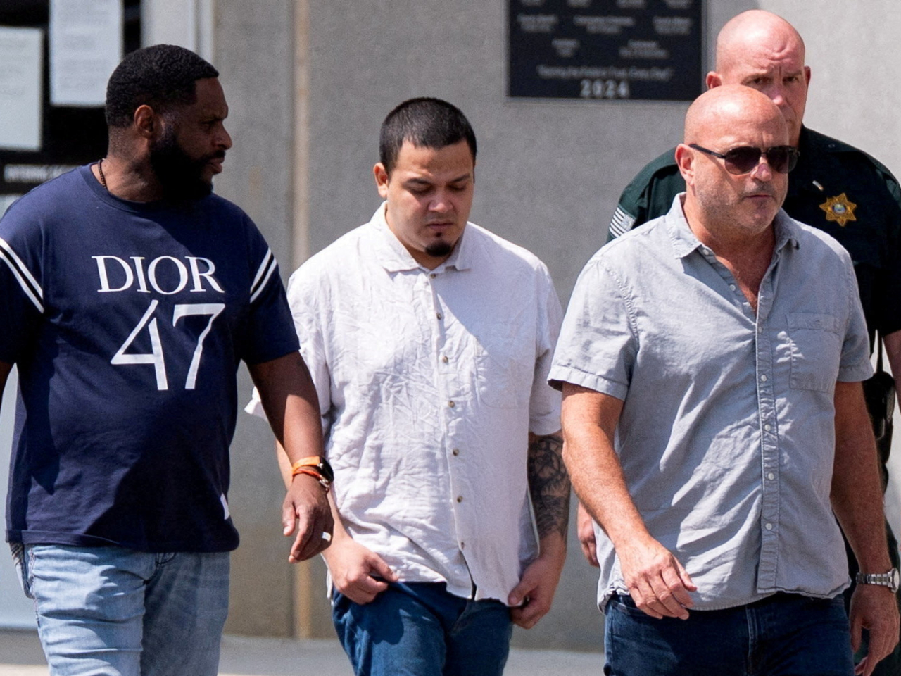 Kilmar Abrego Garcia, second left, leaves Putnam County Jail in Cookeville, Tennessee. Photo: Reuters