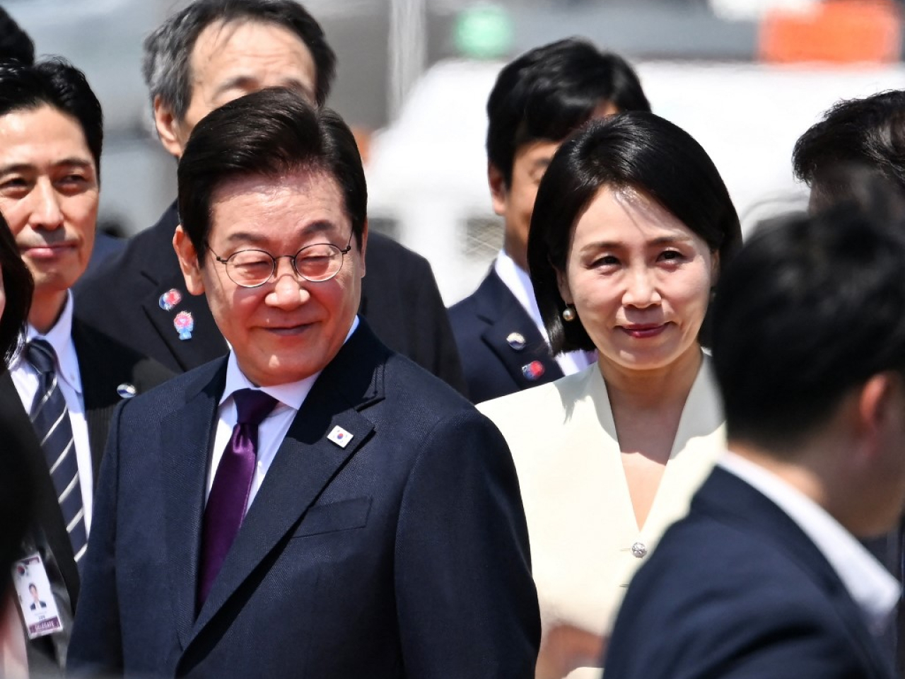 李在明上午抵達日本東京展開為期六日的日美訪問行程。(法新社)