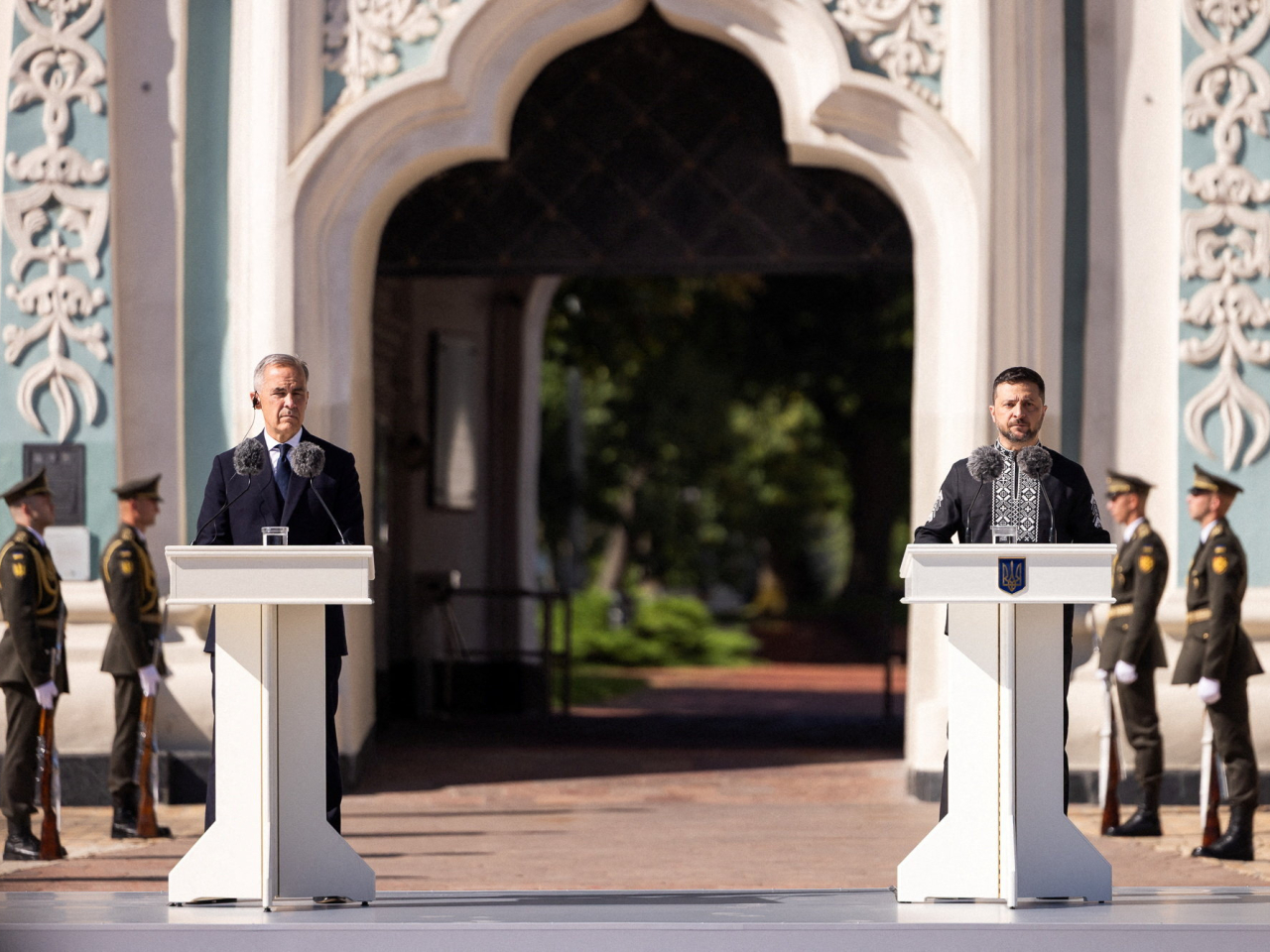 Canadian Prime Minister Mark Carney, left, who is visiting Kyiv as a "special guest" has called on world leaders to push for an end to the Ukraine conflict. Photo: Reuters