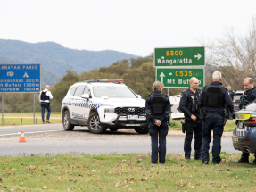 Manhunt on in rural Australia as two policemen killed