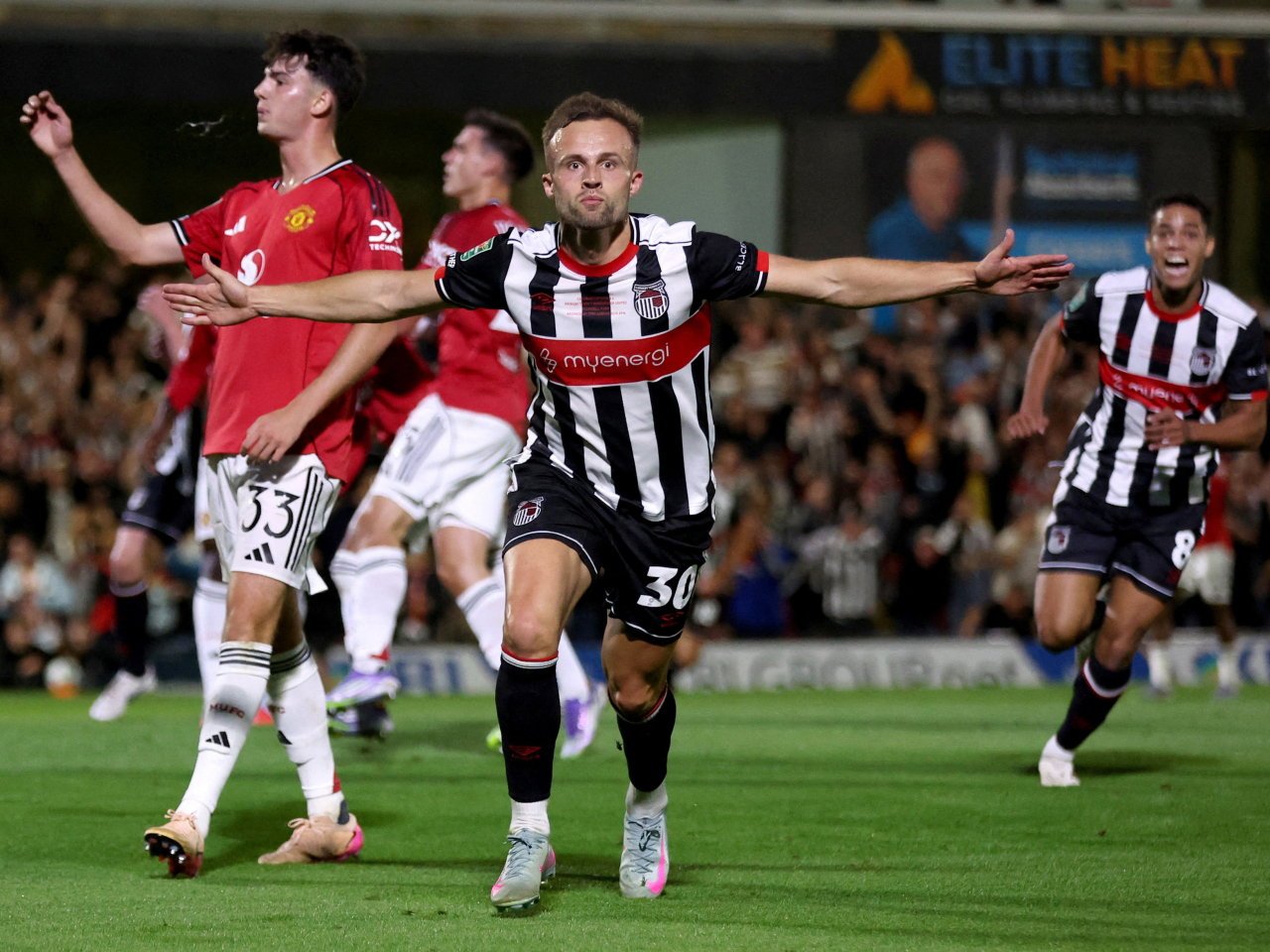 Fourth-tier side Grimsby prevailed 12-11 in a thrilling penalty shoot-out against Manchester United. Photo: Reuters