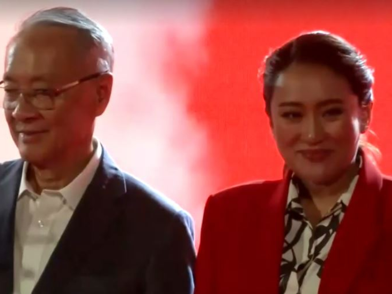 Paetongtarn Shinawatra with Chaikasem Nitisiri, who has been nominated by Pheu Thai as its prime ministerial candidate, at a party election rally. File photo: Reuters