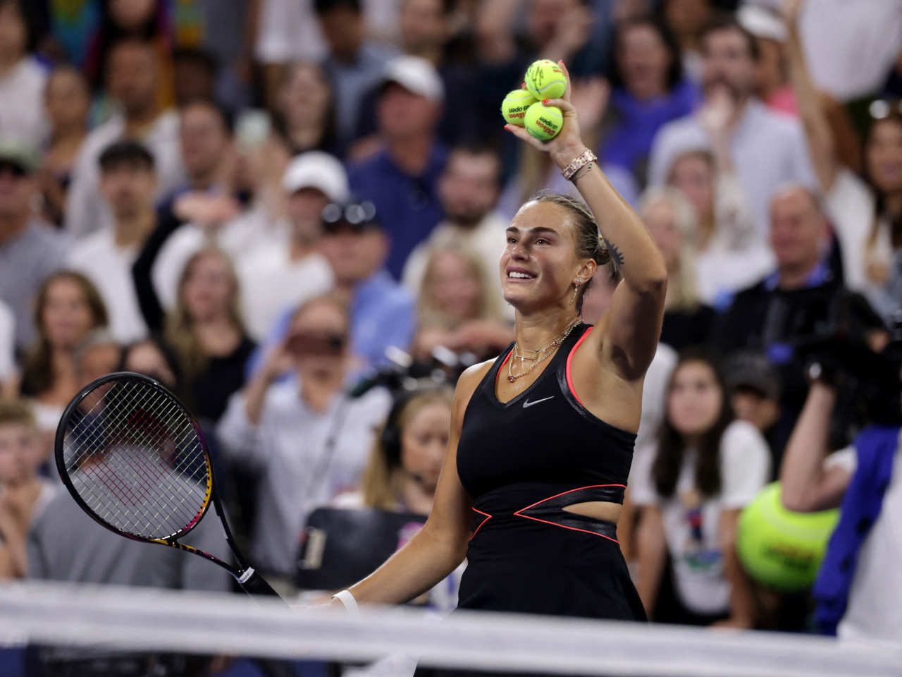 Aryna Sabalenka celebrates after winning her third-round match against Leylah Fernandez. Photo: Reuters