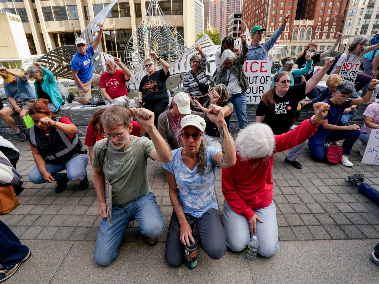 Demonstrators raise their fists in support of Kilmar Abrego, a migrant whose wrongful deportation to El Salvador made him a symbol of aggressive Trump immigration policies, in Baltimore, Maryland. File photo: Reuters
