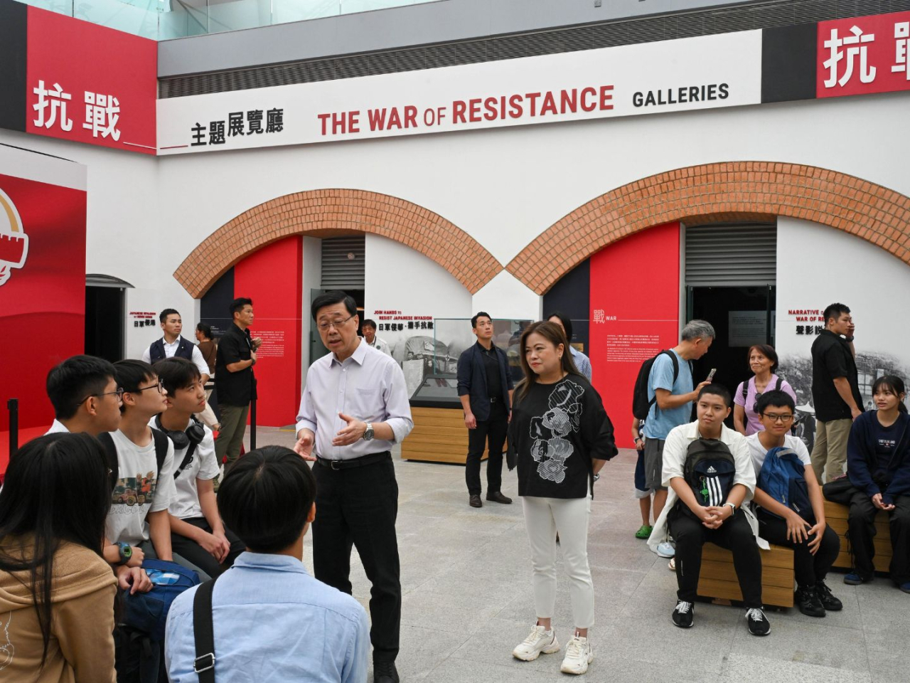 John Lee engages with students at the Hong Kong Museum of the War of Resistance and Coastal Defence. Photo courtesy of Information Services Department
