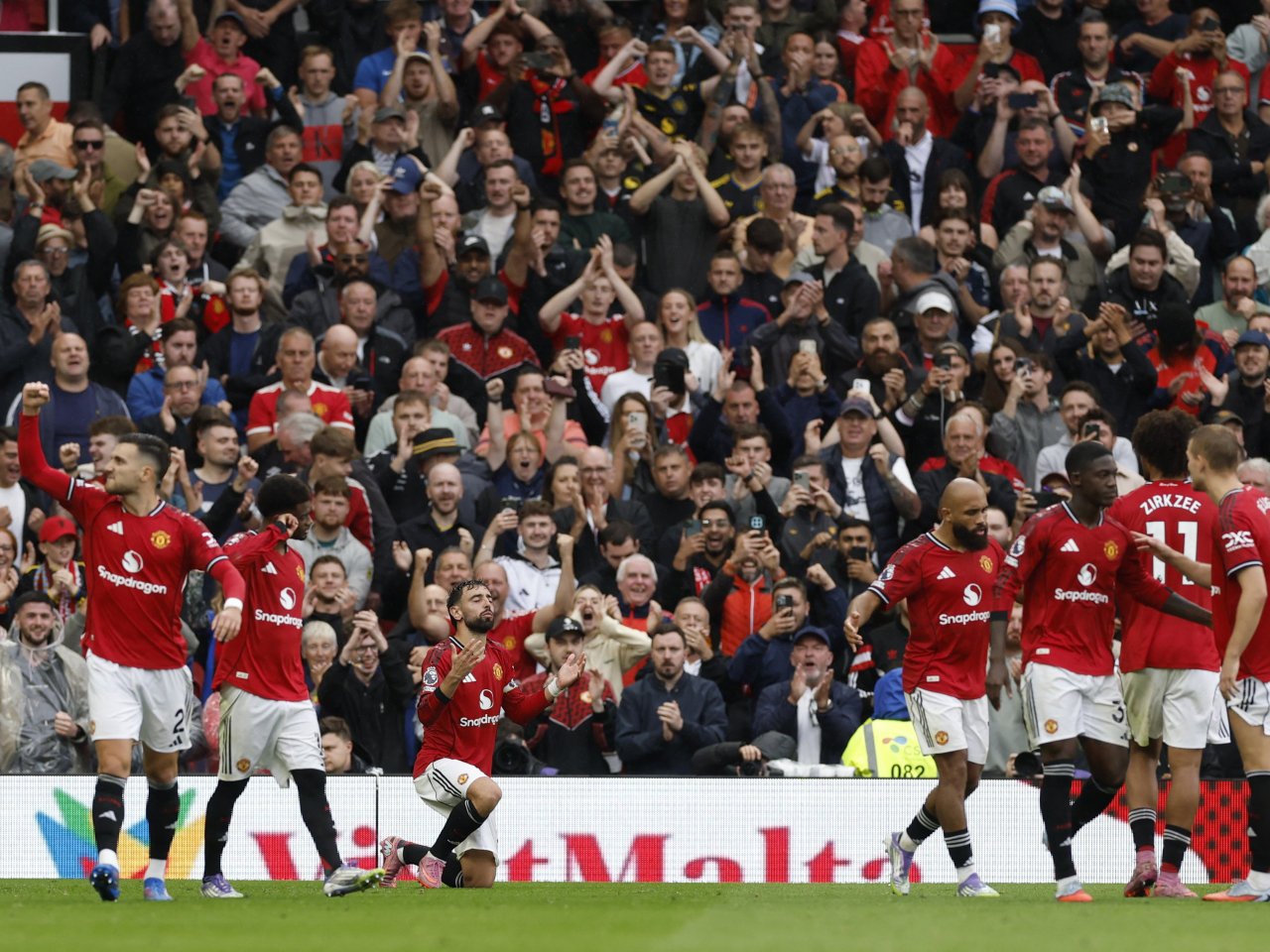 Manchester United's Bruno Fernandes celebrates scoring their third goal from the penalty spot. Photo: Reuters