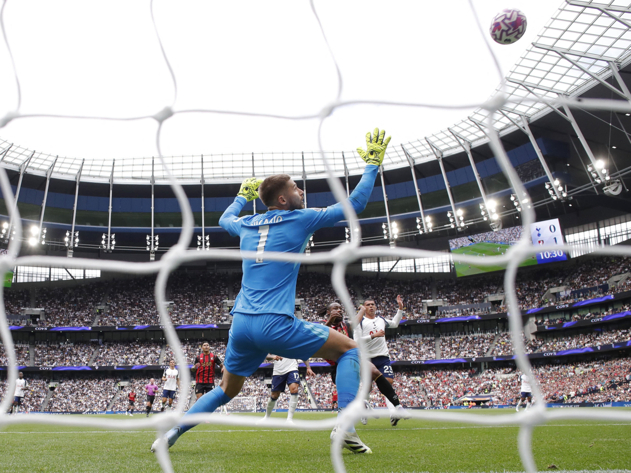 Tottenham Hotspur's Guglielmo Vicario looks on as Bournemouth's Antoine Semenyo shoots at goal. Photo: Reuters