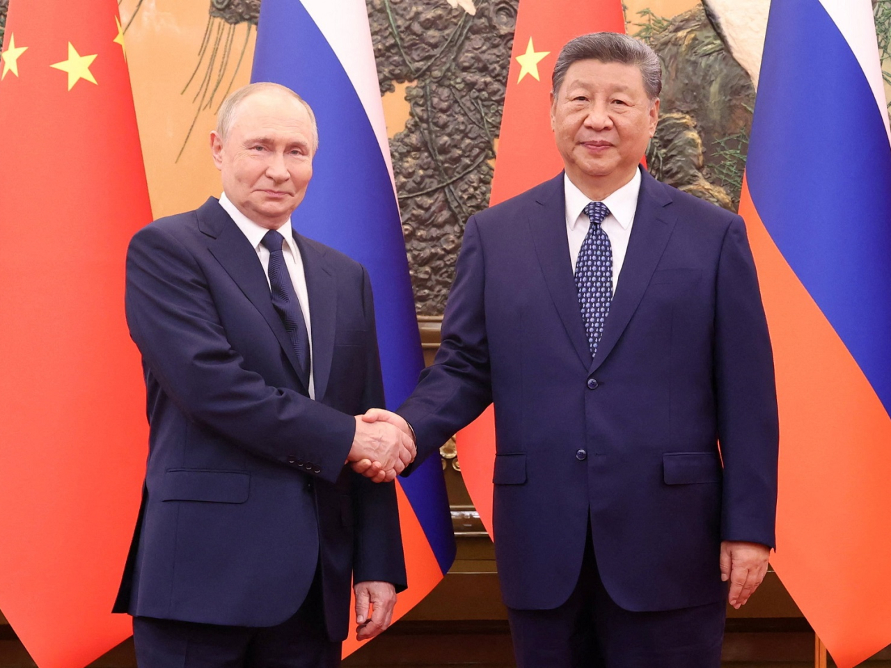 Presidents Xi Jinping and Vladimir Putin hold talks in Beijing. Photo: China Daily via Reuters